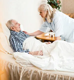 Compassionate caregiver supporting a loved one during end of life care